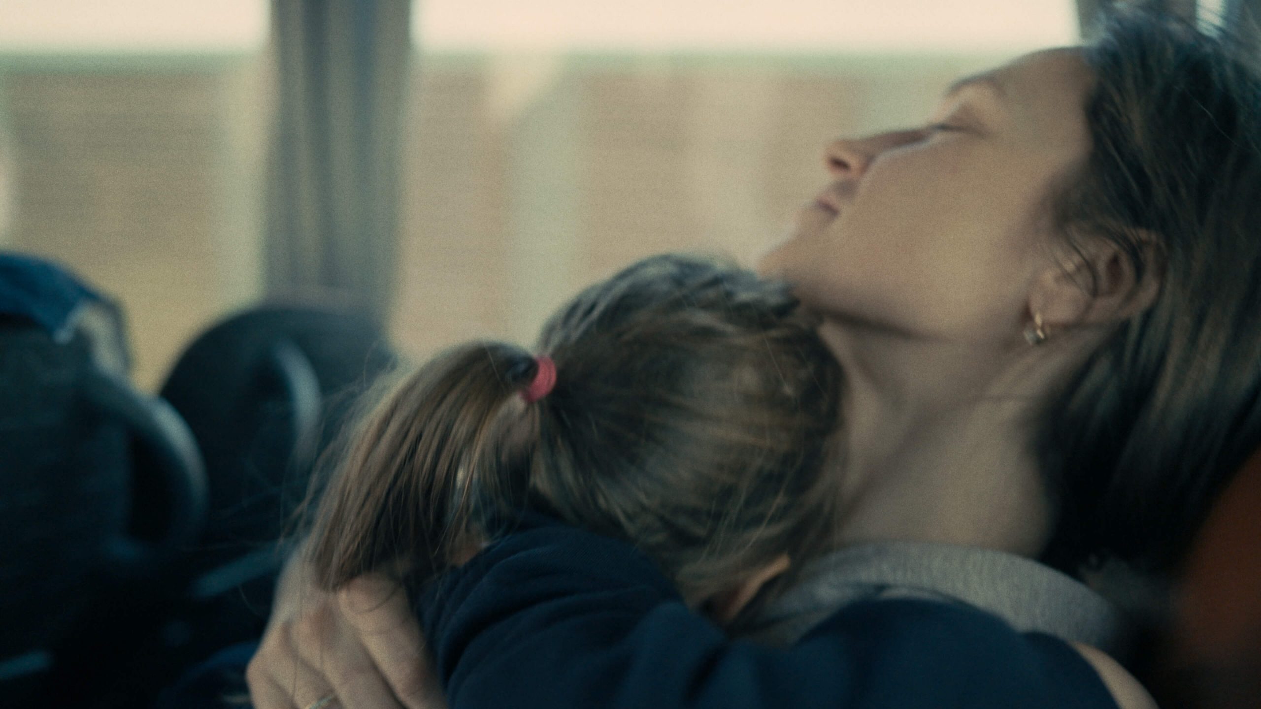 Mother and daughter on a bus